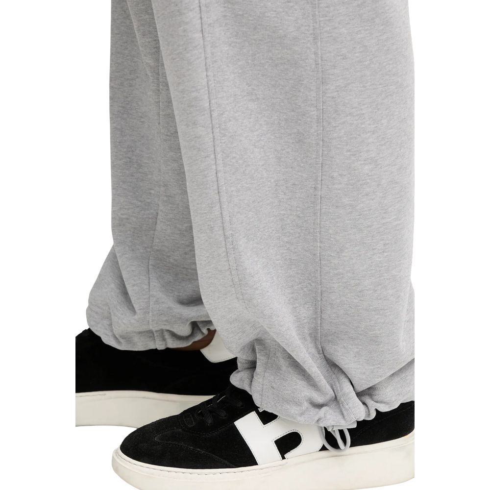 Activewear Jogger Pants by Calvin Klein Jeans for women in cotton terrycloth gray features an sporty relaxed-fit & wide with a and long, showcasing sporty .