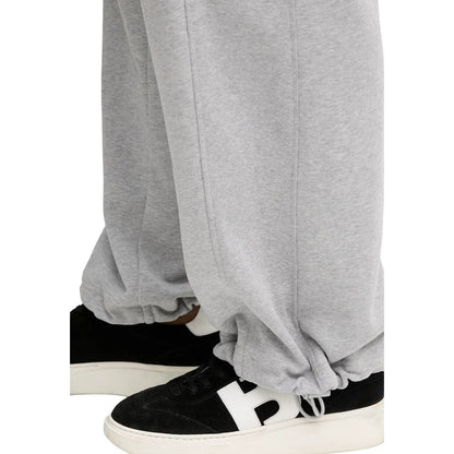 Activewear Jogger Pants by Calvin Klein Jeans for women in cotton terrycloth gray features an sporty relaxed-fit & wide with a and long, showcasing sporty .