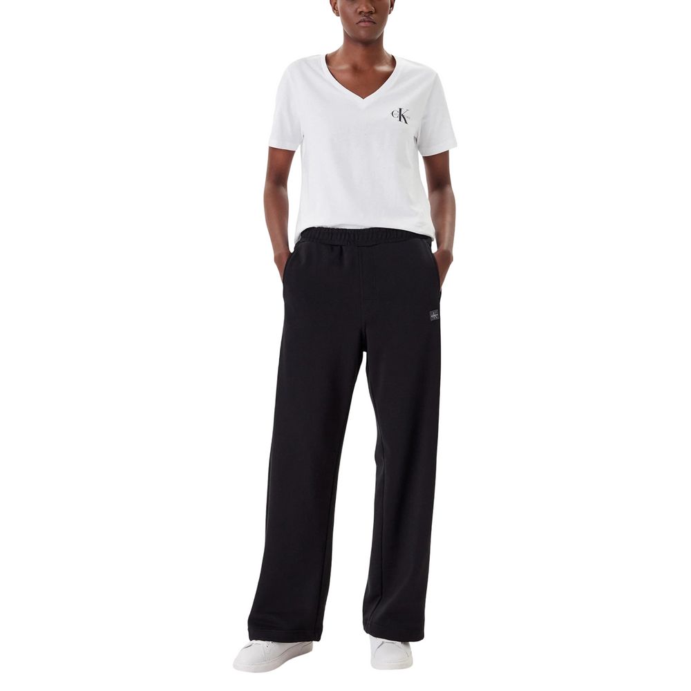Activewear Jogger Pants by Calvin Klein Jeans for women in cotton terrycloth black features an dynamic relaxed-fit & wide with long, , and functional for an dynamic silhouette.