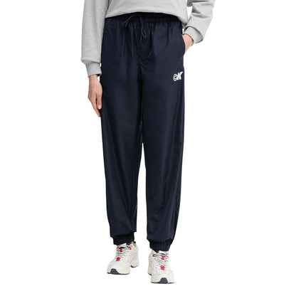 Activewear Jogger Pants by Calvin Klein Jeans for women in polyester blue features an kinetic relaxed-fit and long with a , showcasing high-performance for an kinetic look.