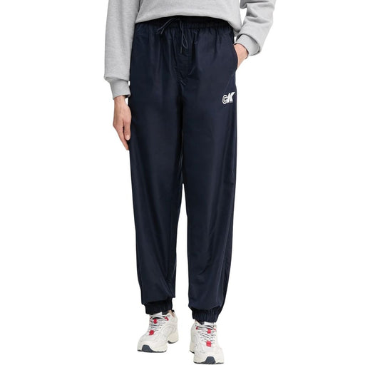 Activewear Jogger Pants by Calvin Klein Jeans for women in polyester blue features an kinetic relaxed-fit and long with a , showcasing high-performance for an kinetic look.