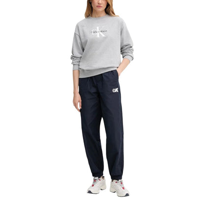 Activewear Jogger Pants by Calvin Klein Jeans for women in polyester blue features an sporty relaxed-fit with a and long, showcasing sporty .