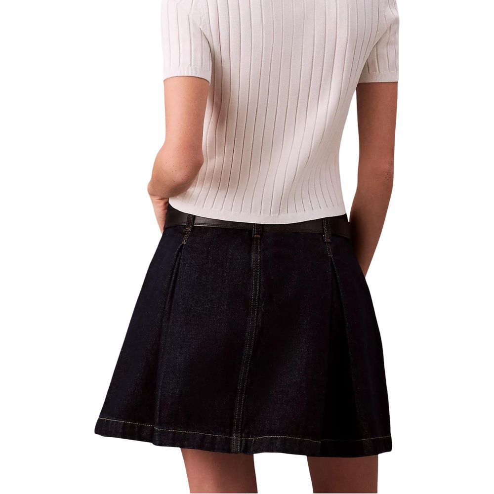 Skirt by Calvin Klein Jeans for women in cotton & metal blue showcases a sultry silhouette, elegantly defined by its short mini and the sophisticated sultry design of the Women's Short Mini Pleated Flared Cotton & Metal Skirt.