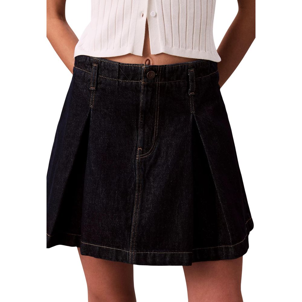 Skirt by Calvin Klein Jeans for women in cotton & metal blue features an relaxed-yet-refined silhouette that elegantly showcases the Women's Short Mini Pleated Flared Cotton & Metal Skirt design and sophisticated short mini.