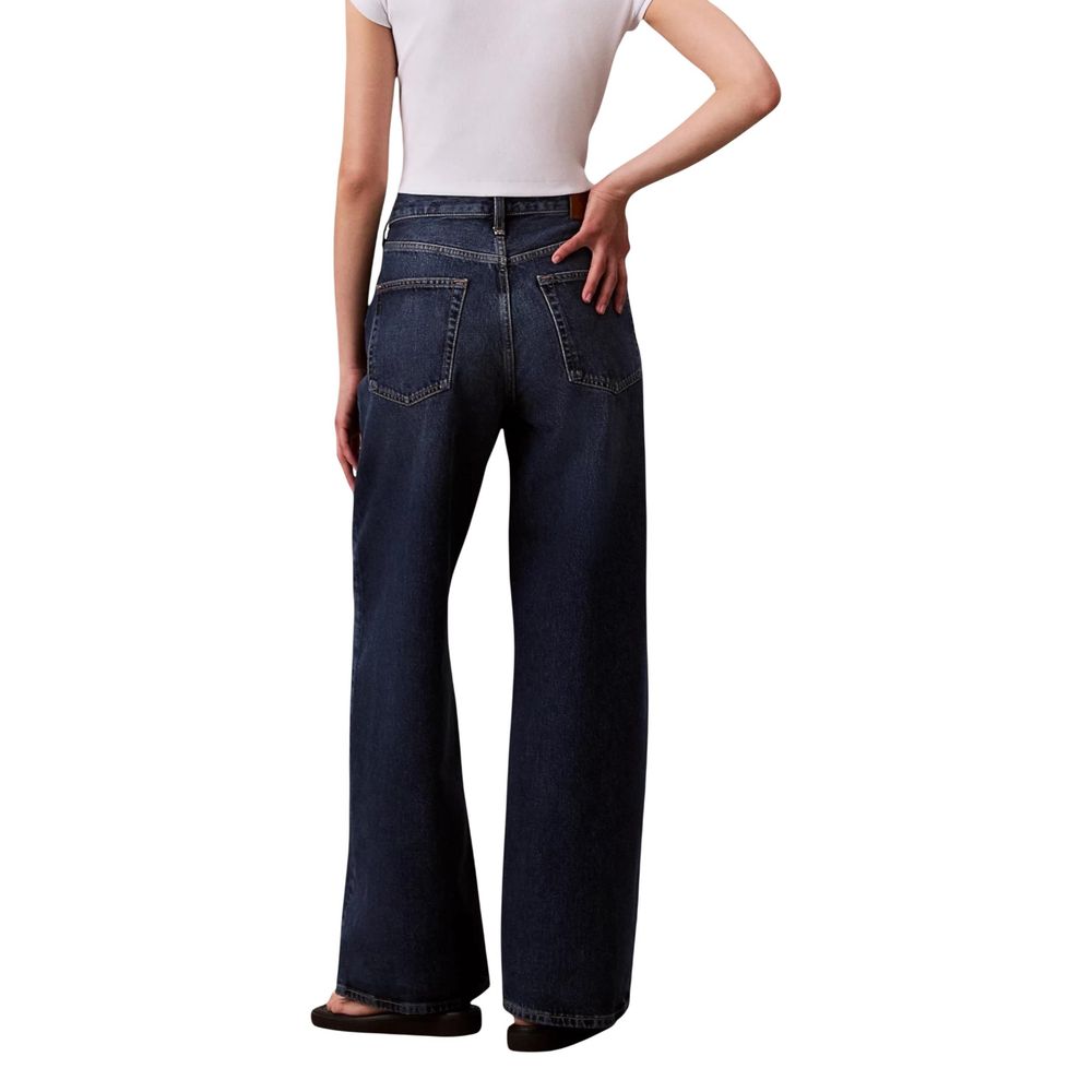 Jeans by Calvin Klein Jeans for women in denim cotton blue presents a tailored silhouette, showcasing a tailored flared, bootcut & wide and long cut with a refined mid rise for a truly tailored aesthetic.