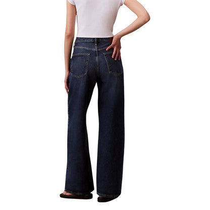 Jeans by Calvin Klein Jeans for women in denim cotton blue presents a tailored silhouette, showcasing a tailored flared, bootcut & wide and long cut with a refined mid rise for a truly tailored aesthetic.