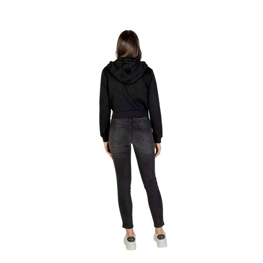 Hooded Hoodie by Guess Active for women in stretch polyester cotton black features a slouchy chic silhouette, detailed with a slouchy chic and a signature hooded neckline for an elevated aesthetic.