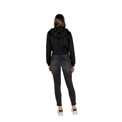 Hooded Hoodie by Guess Active for women in stretch polyester cotton black features a slouchy chic silhouette, detailed with a slouchy chic and a signature hooded neckline for an elevated aesthetic.