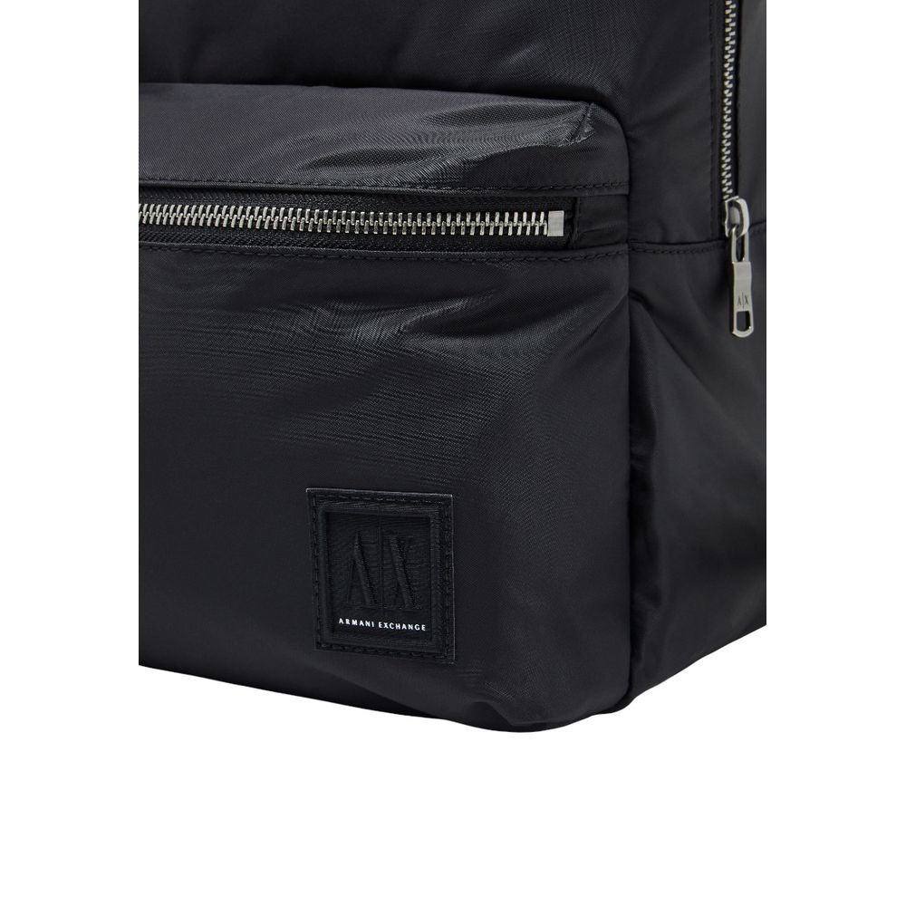 Backpack by Armani Exchange for men in polyamide black features a stately Polyamide Backpack design, showcasing a secure zipper, ample , and versatile backpack-strap & adjustable-strap for a stately finish.