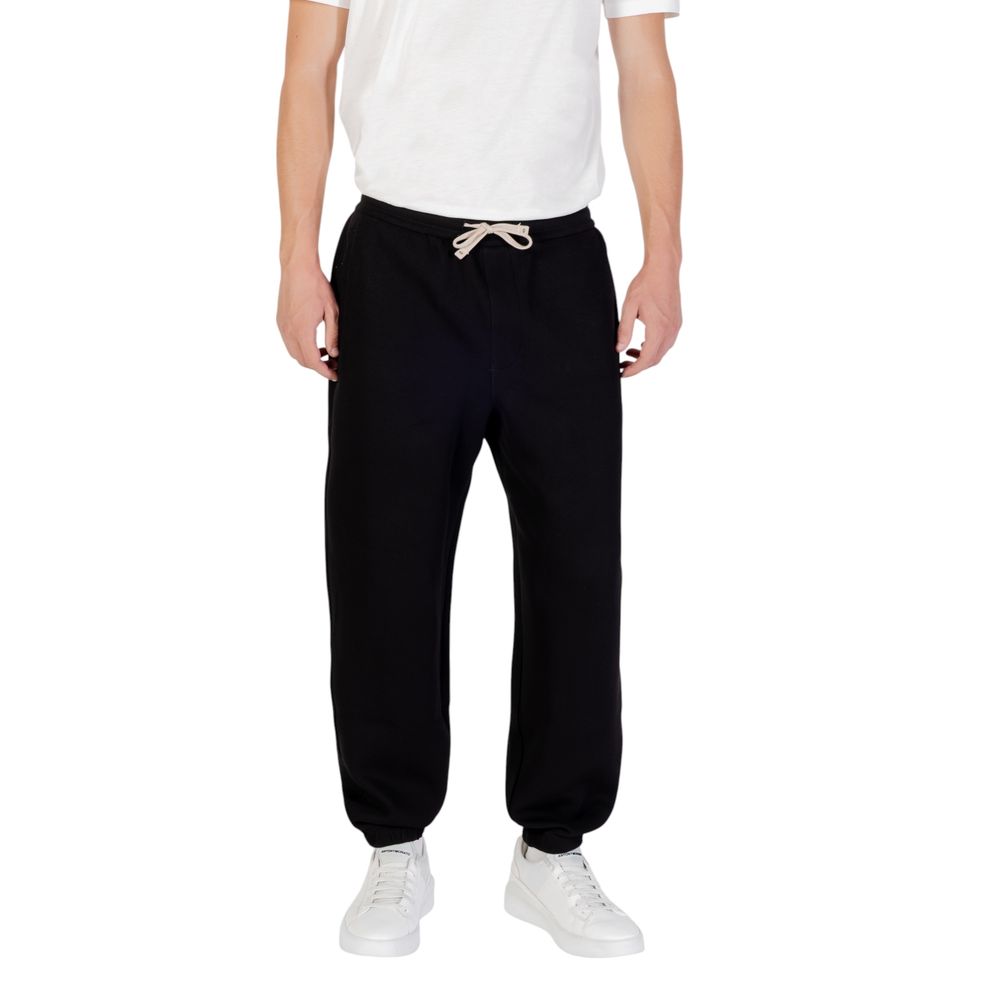 Activewear Jogger Pants by Armani Exchange for men in stretch polyester cotton black features a versatile silhouette, integrating performance with a versatile straight-leg, long, and comfortable .