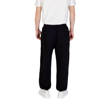Activewear Jogger Pants by Armani Exchange for men in stretch polyester cotton black features an kinetic straight-leg and long with a , showcasing high-performance for an kinetic look.