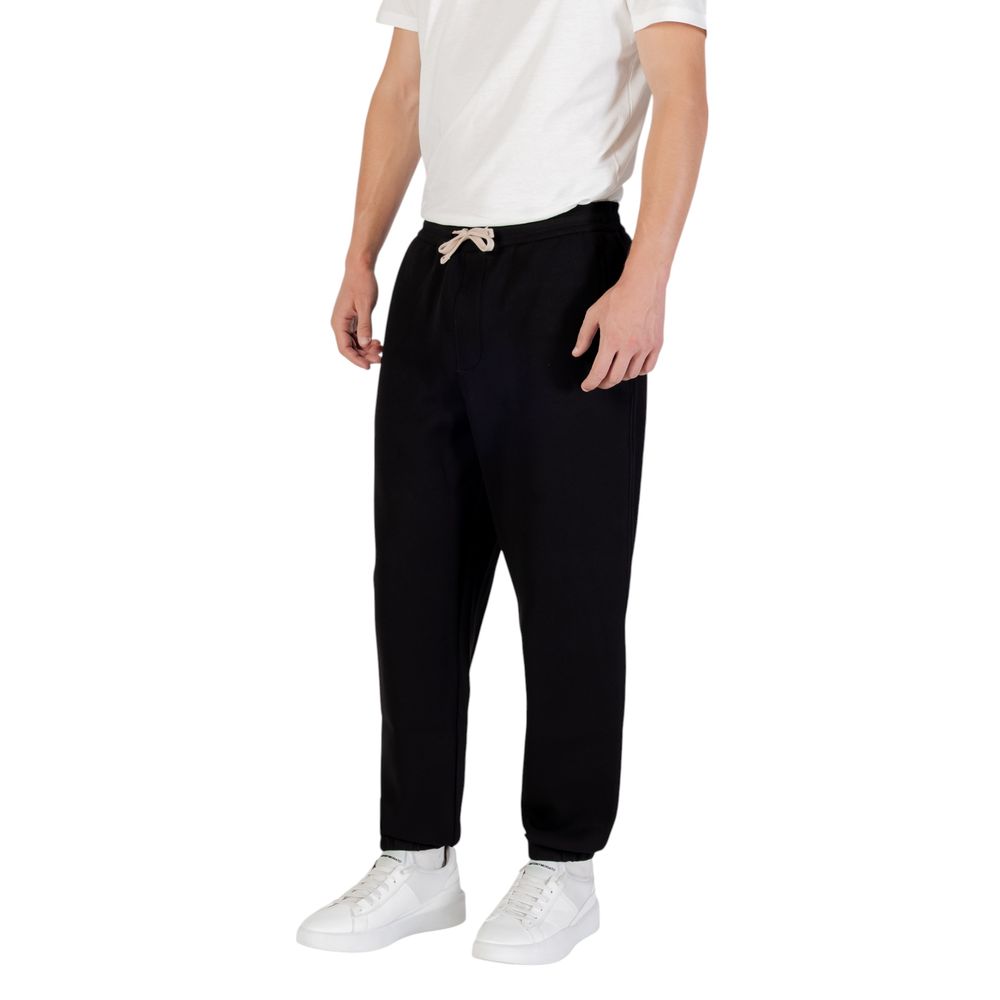 Activewear Jogger Pants by Armani Exchange for men in stretch polyester cotton black features an ergonomic straight-leg and with a ergonomic long, showcasing innovative for a ergonomic look.