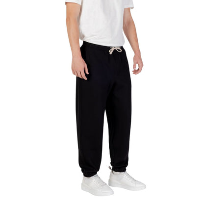 Activewear Jogger Pants by Armani Exchange for men in stretch polyester cotton black features an sporty straight-leg with a and long, showcasing sporty .
