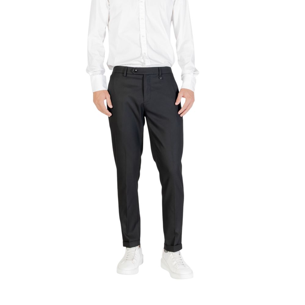 Trousers by Antony Morato for men in stretch polyester viscose twill black features a sculptural silhouette, showcasing a sculptural skinny, slim & cropped and cropped with a sophisticated for a sculptural finish.