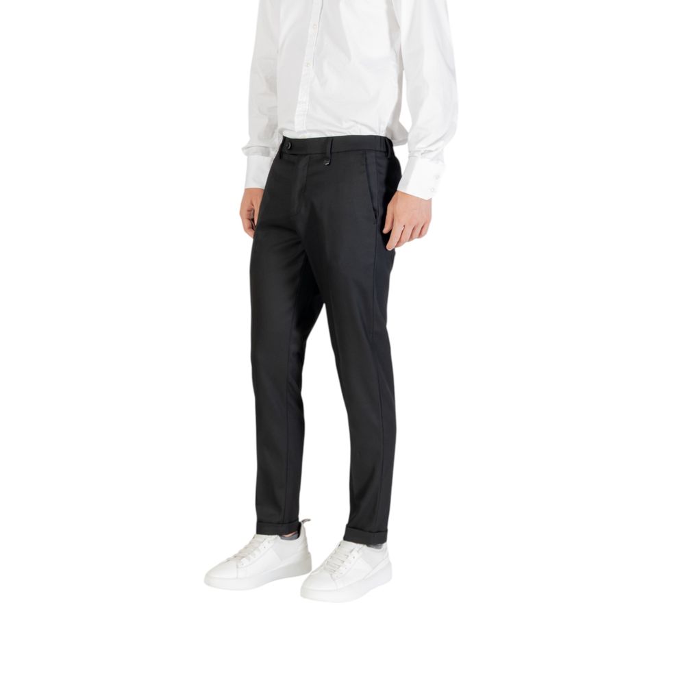 Trousers by Antony Morato for men in stretch polyester viscose twill black features an on trend silhouette, showcasing a sophisticated skinny, slim & cropped with a cropped and for an on trend finish.
