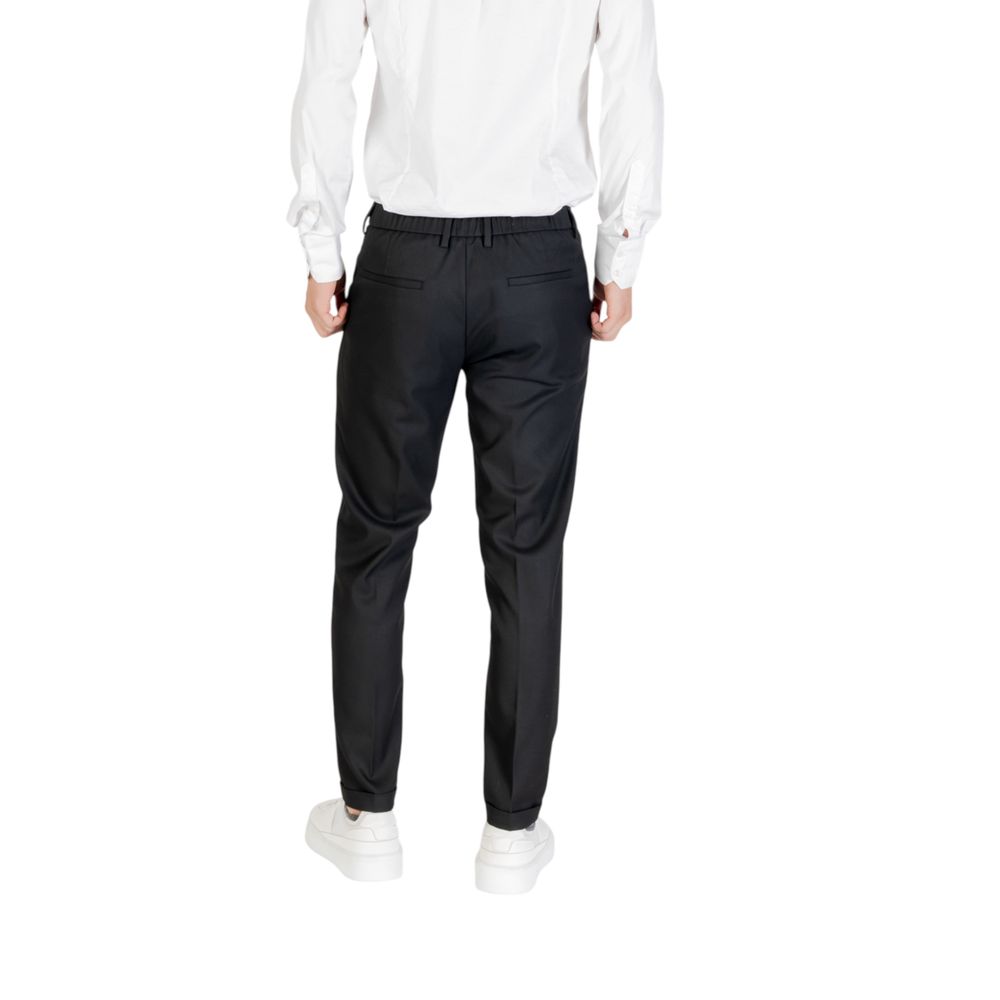 Trousers by Antony Morato for men in stretch polyester viscose twill black features a tailored silhouette with a tailored skinny, slim & cropped, defined by its cropped and a sophisticated .