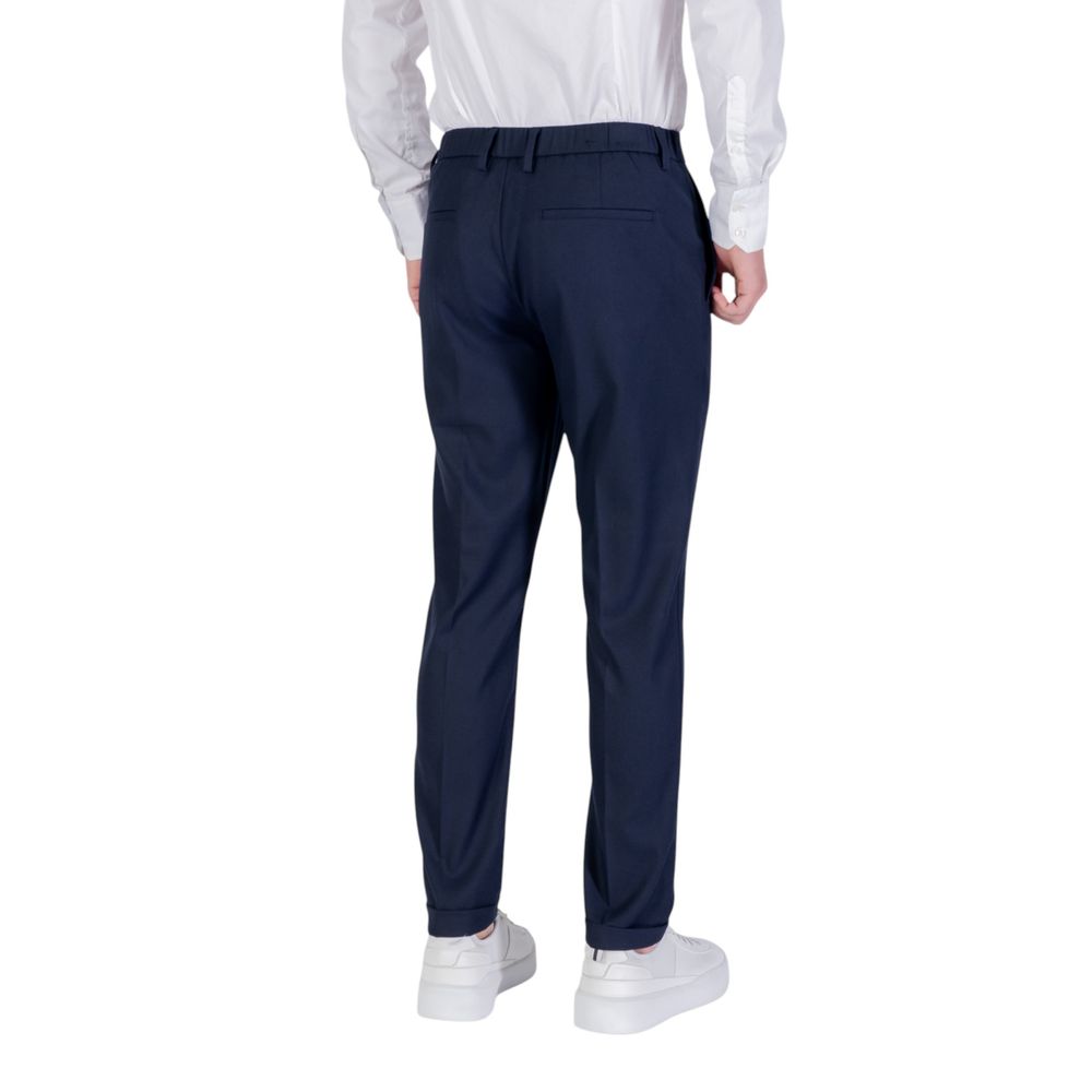 Trousers by Antony Morato for men in stretch polyester viscose twill blue presents a perennial silhouette, meticulously tailored with a skinny, slim & cropped cut, cropped finish, and an elegant .