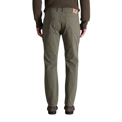 Trousers by Jeckerson for men in stretch cotton green features a sculptural silhouette, showcasing a sculptural skinny & slim and long with a sophisticated for a sculptural finish.