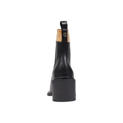 Ankle Boots by Alviero Martini Prima Classe for women in polyethylene & polyurethane black features an performance-driven Women's Polyethylene & Polyurethane Ankle Boots silhouette, defined by a sophisticated block-heel and a performance-driven .