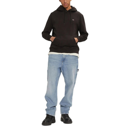 Hooded Hoodie by Tommy Hilfiger Jeans for men in cotton & kangaroo black features an dramatic silhouette, showcasing a sophisticated hooded neckline and dramatic for a refined, modern aesthetic.