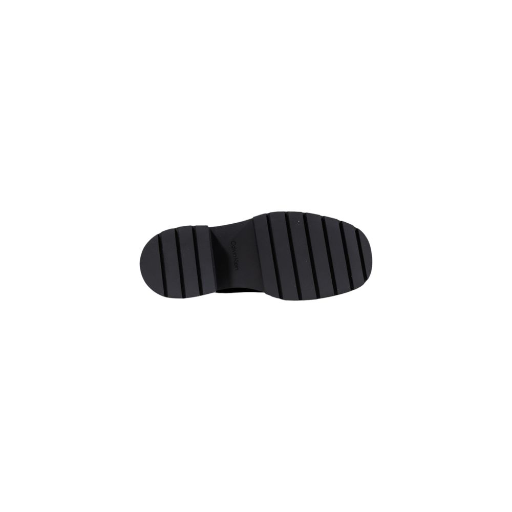 Ankle Chelsea Winter Boots by Calvin Klein Jeans for women in leather black features an aerodynamic silhouette from the Women's Leather Ankle Chelsea Winter Boots collection, showcasing a aerodynamic and refined for an aerodynamic look.