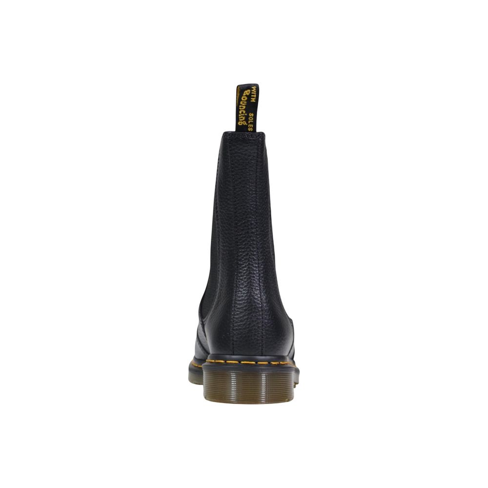 Ankle Chelsea Boots by Dr. Martens for women in leather black showcases a ergonomic silhouette from the Women's Leather Ankle Chelsea Boots collection, featuring a ergonomic and a ergonomic .