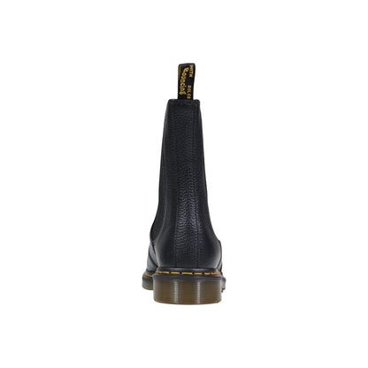 Ankle Chelsea Boots by Dr. Martens for women in leather black showcases a ergonomic silhouette from the Women's Leather Ankle Chelsea Boots collection, featuring a ergonomic and a ergonomic .