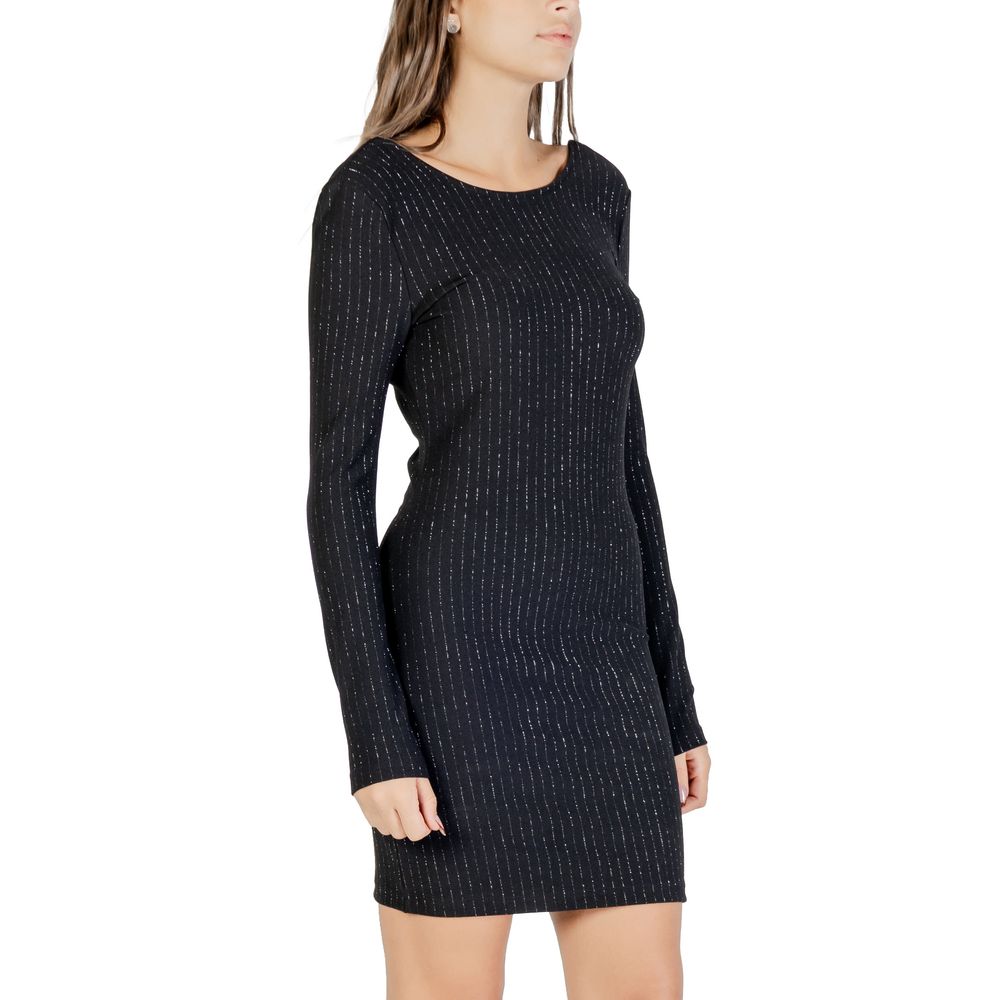 Dress by Jacqueline De Yong for women in stretch polyester & lurex black & striped features a dramatic silhouette, showcasing an elegant and that flows into a dramatic short.