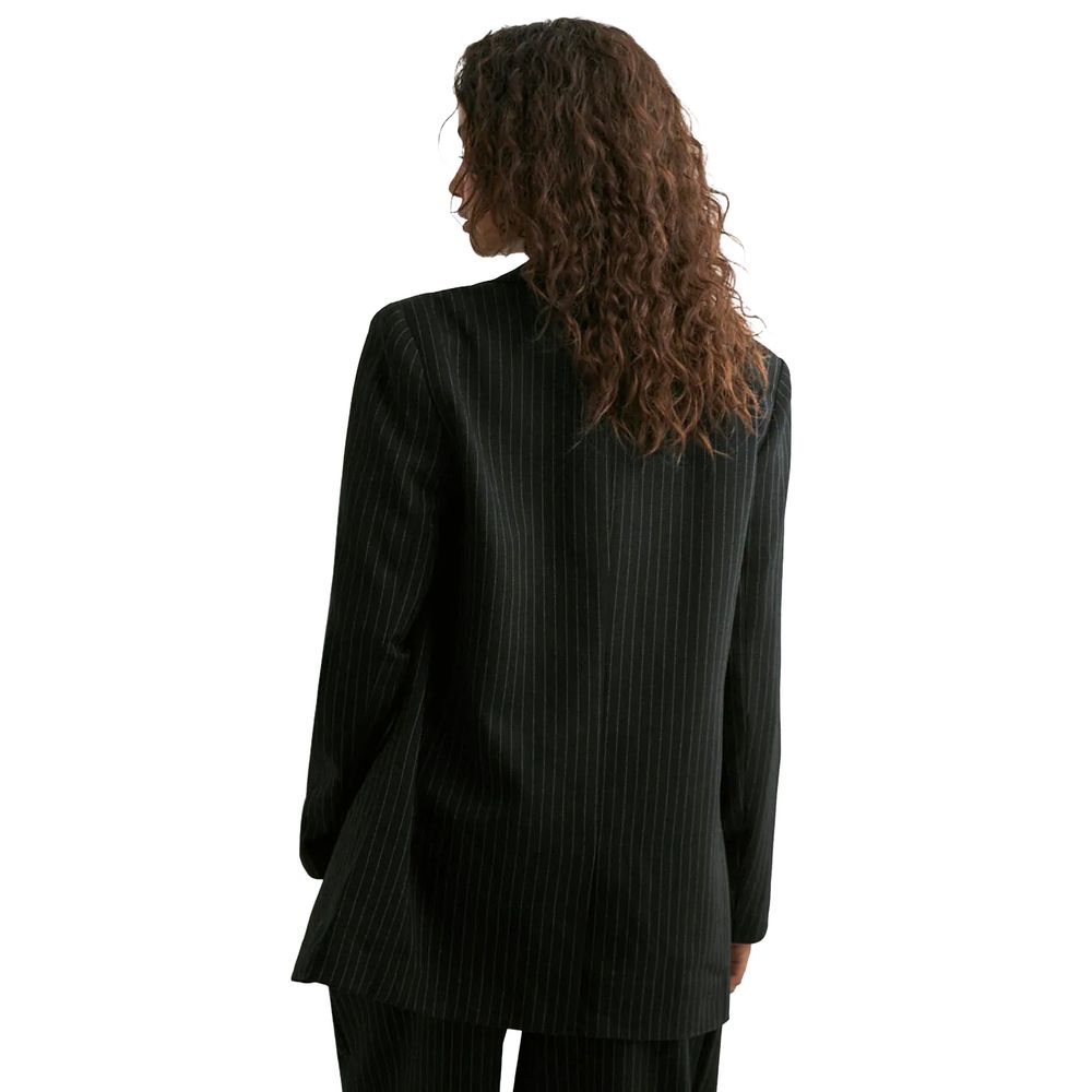 Blazer by Only for women in polyester & viscose black showcases a polished silhouette, highlighted by a refined and polished for a sophisticated finish.