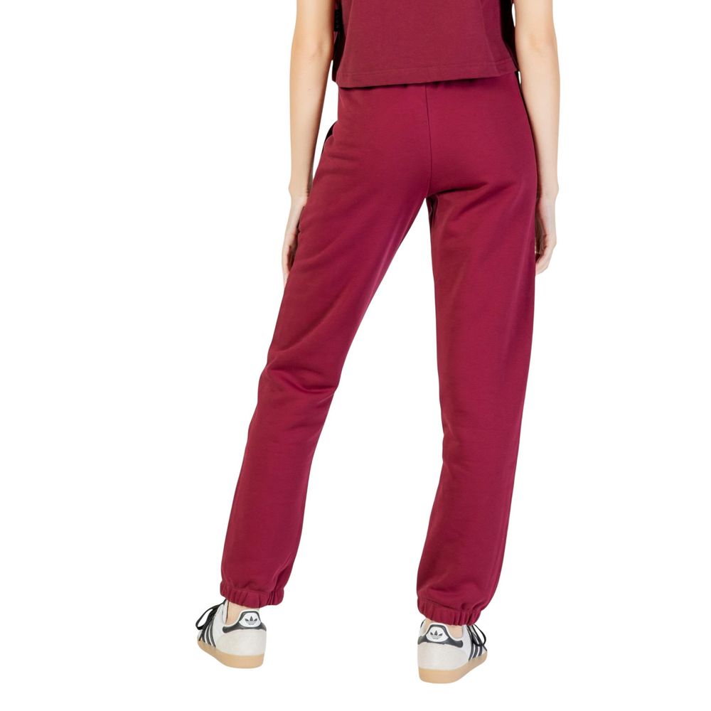 Activewear Jogger Pants by Icon for women in cotton polyester bordeaux features a athletic regular-fit with a and long, showcasing athletic for a sophisticated performance look.