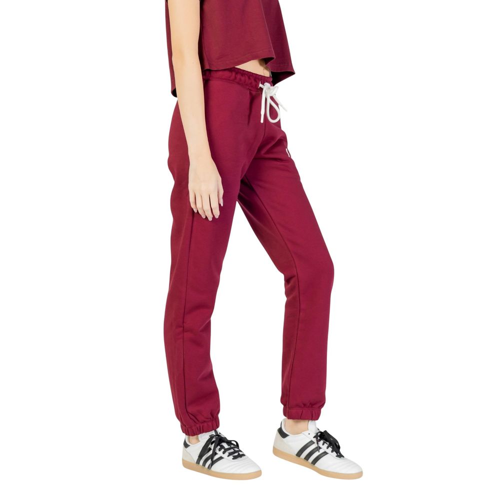 Activewear Jogger Pants by Icon for women in cotton polyester bordeaux features an sporty regular-fit with a and long, showcasing sporty .