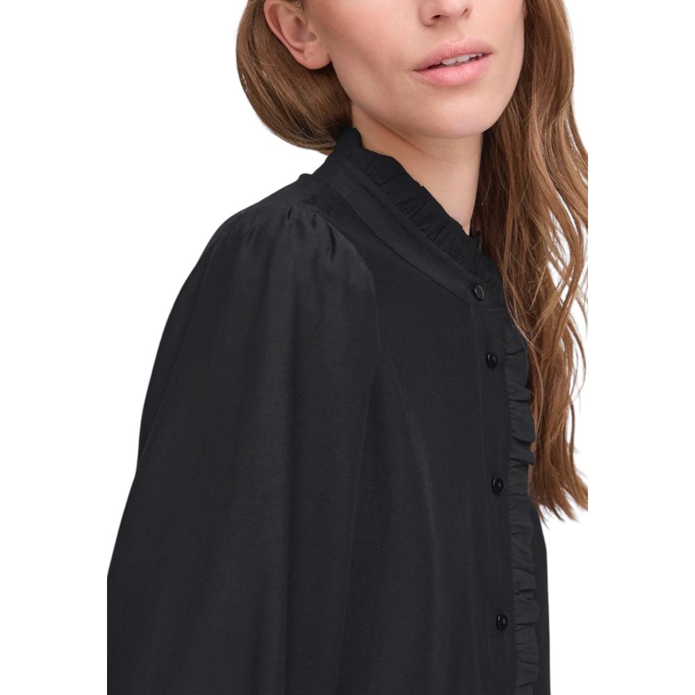 Shirt by ICHI for women in polyester & viscose black showcases a sleek silhouette, elegantly detailed with a sleek mandarin neckline and for a sleek finish.