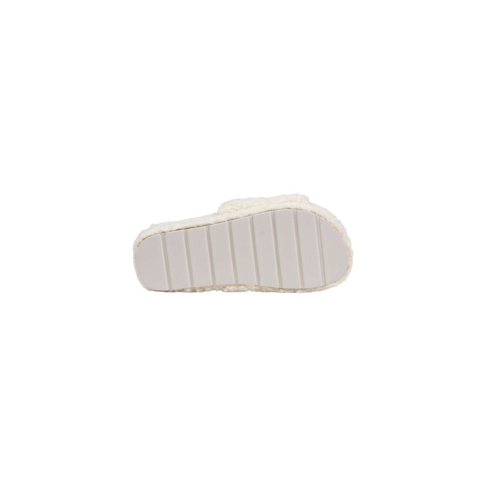 Platform Slippers by Ralph Lauren for women in textile cream presents a effortless silhouette, showcasing the elegant Women's Textile Platform Slippers design with its unique platform and sophisticated .