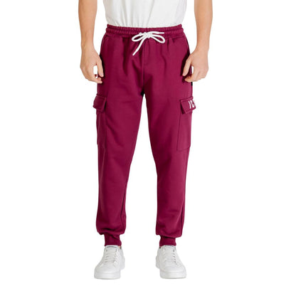 Activewear Jogger Pants by Icon for men in cotton polyester bordeaux features a contemporary silhouette with , a contemporary relaxed-fit, long hem, and for a premium, high-performance aesthetic.