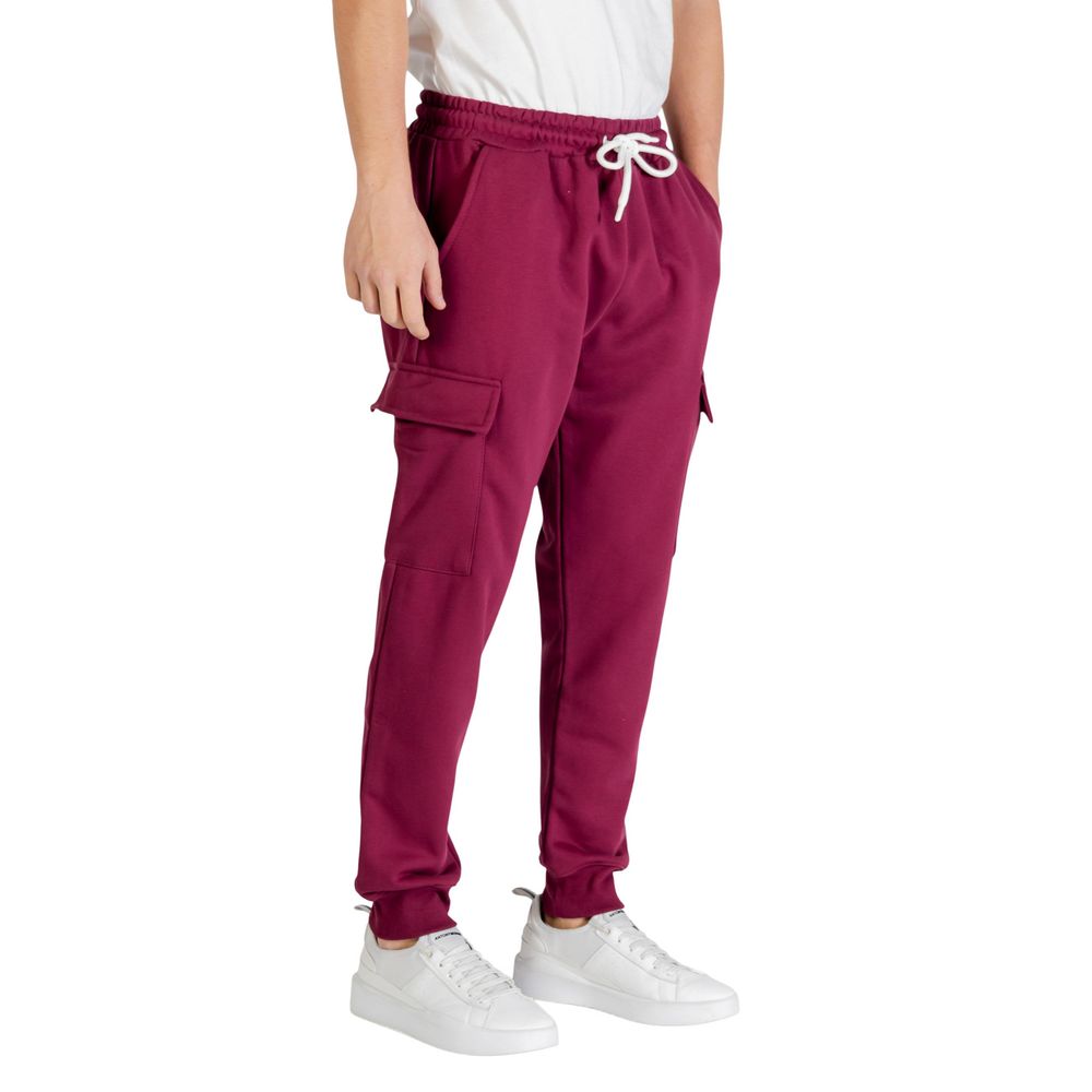 Activewear Jogger Pants by Icon for men in cotton polyester bordeaux features an sporty relaxed-fit with a and long, showcasing sporty .