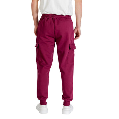 Activewear Jogger Pants by Icon for men in cotton polyester bordeaux features a contemporary silhouette with , a contemporary relaxed-fit, long hem, and for a premium, high-performance aesthetic.