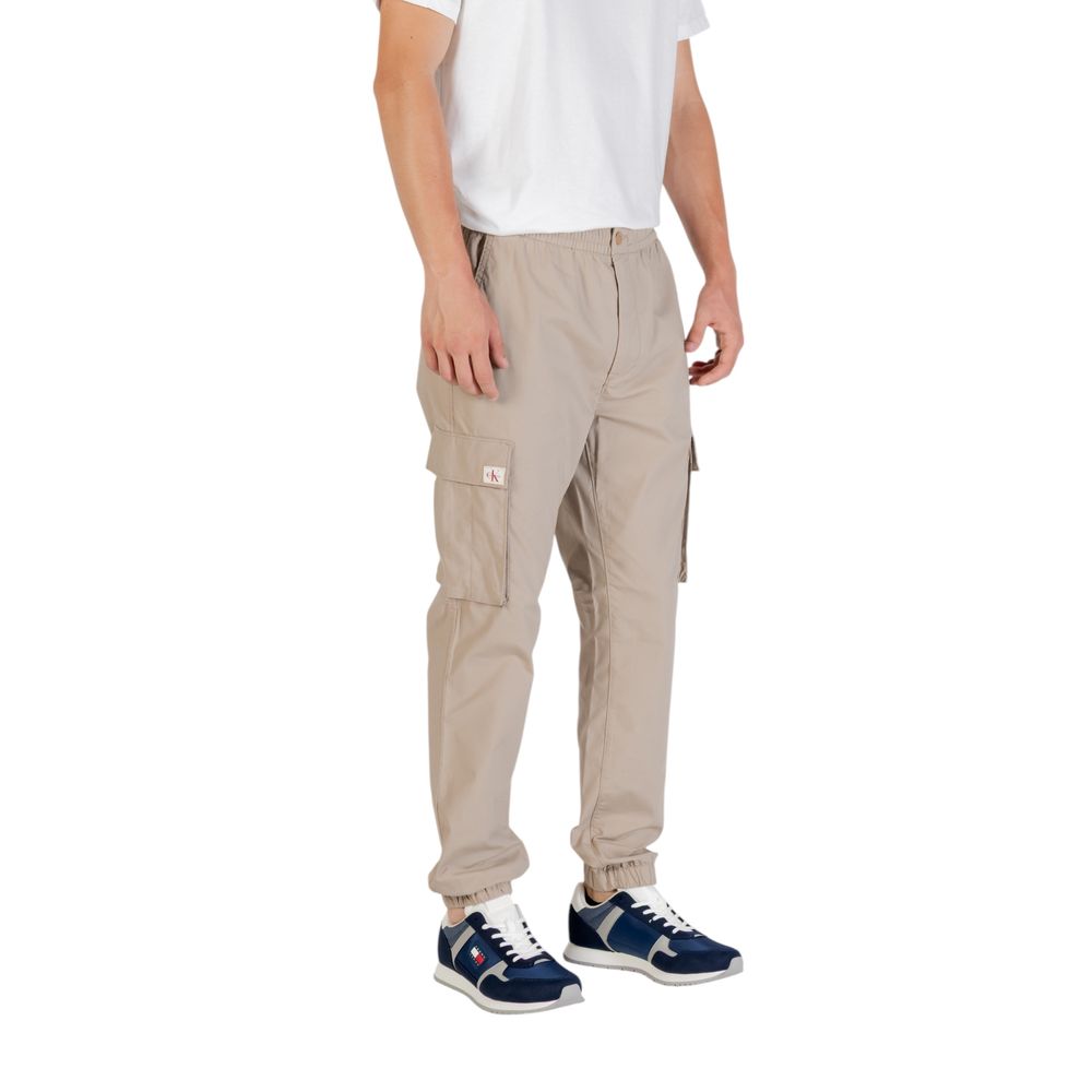 Cargo Pants by Calvin Klein Jeans for men in stretch polyester cotton brown features a sartorial silhouette, showcasing a sophisticated regular-fit with a refined long and elegant .