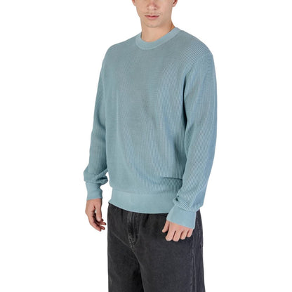 Sweatshirt by Calvin Klein Jeans for men in cotton & polyester blue showcases a slouchy chic silhouette, artfully detailed with a slouchy chic crew neckline and for a slouchy chic finish.