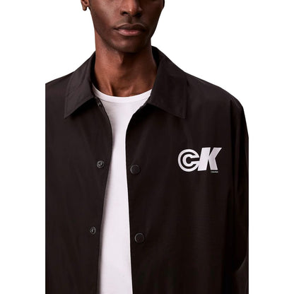 Windbreaker Jacket by Calvin Klein Jeans for men in nylon & polyester black showcases a modern silhouette, integrating windproof and a modern for a sophisticated finish.