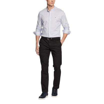 Trousers by Tommy Hilfiger for men in stretch cotton black features an sartorial silhouette, showcasing a precise regular-fit and long with a sartorial for a refined look.