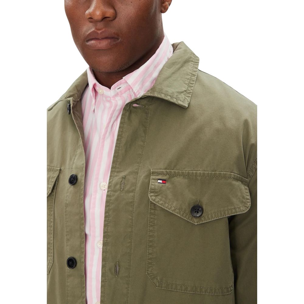 Overcoat by Tommy Hilfiger for men in cotton twill showcases a architectural silhouette, artfully detailed with a distinctive and functional pockets for a architectural finish.
