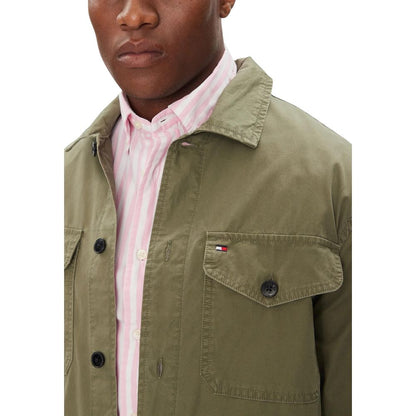 Overcoat by Tommy Hilfiger for men in cotton twill showcases a architectural silhouette, artfully detailed with a distinctive and functional pockets for a architectural finish.