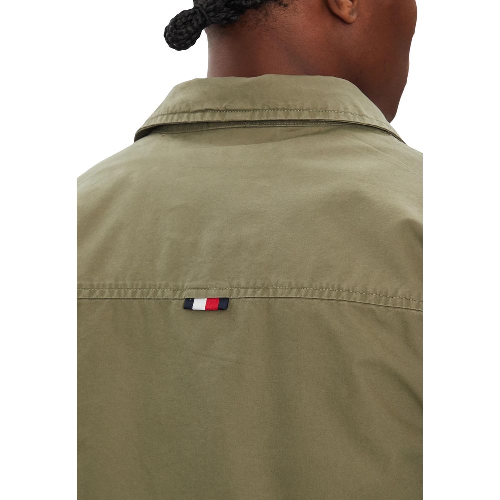 Overcoat by Tommy Hilfiger for men in cotton twill features an satoral silhouette, showcasing a sophisticated and satoral pockets for a premium, timeless look.