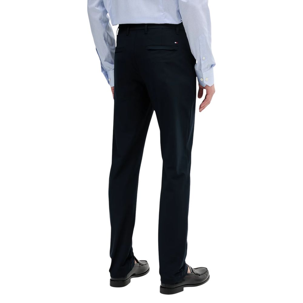 Trousers by Tommy Hilfiger for men in stretch polyester blue & natural features a sculptural silhouette, showcasing a sculptural regular-fit and long with a sophisticated for a sculptural finish.