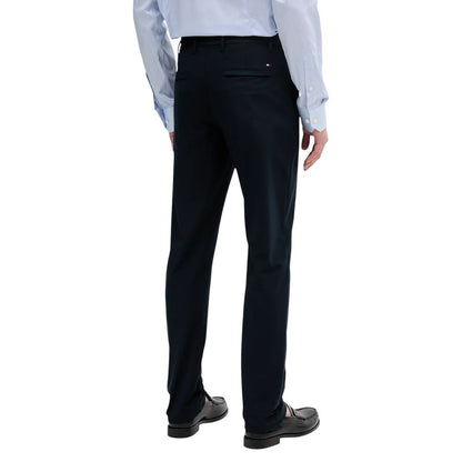 Trousers by Tommy Hilfiger for men in stretch polyester blue & natural features a sculptural silhouette, showcasing a sculptural regular-fit and long with a sophisticated for a sculptural finish.