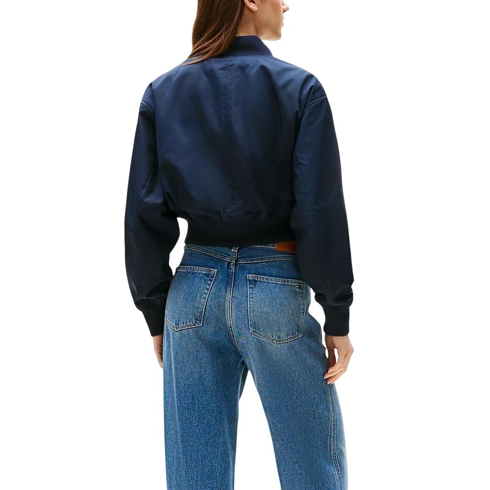 Bomber Jacket by Tommy Hilfiger for women in polyester blue showcases a bohemian silhouette, artfully detailed with a bohemian and signature for a truly bohemian finish.