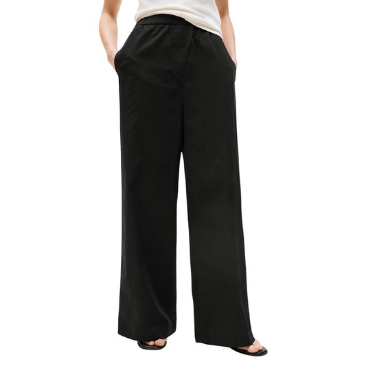 Trousers by Tommy Hilfiger for women in organic cotton black features a tailored silhouette with a tailored flared, bootcut, relaxed-fit & wide, defined by its long and a sophisticated .