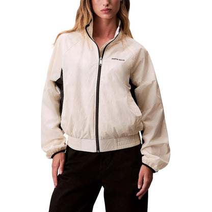 Windbreaker Jacket by Calvin Klein Jeans for women in polypropylene white features an magnificent silhouette, showcasing the sophisticated high-collar neckline and functional lightweight & windproof for a premium, magnificent look.