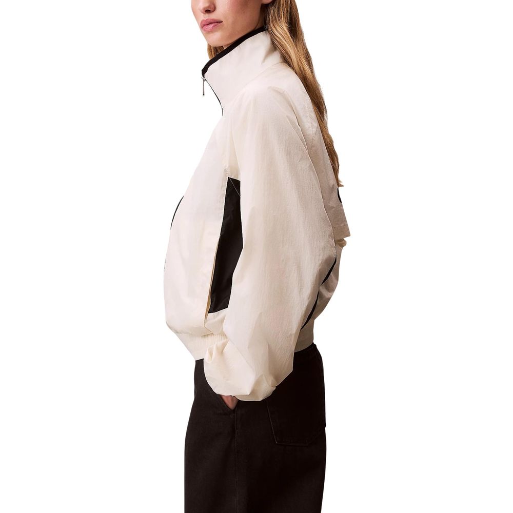 Windbreaker Jacket by Calvin Klein Jeans for women in polypropylene white features an stylish silhouette, showcasing a sophisticated and performance-driven lightweight & windproof for a premium, stylish look.