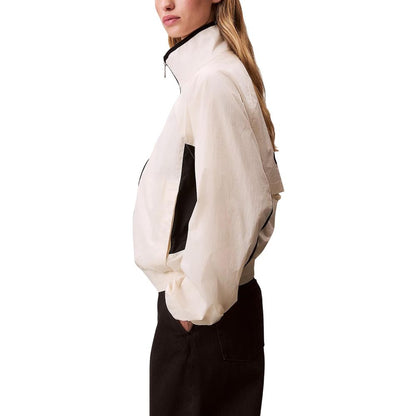 Windbreaker Jacket by Calvin Klein Jeans for women in polypropylene white features an stylish silhouette, showcasing a sophisticated and performance-driven lightweight & windproof for a premium, stylish look.